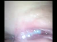 Perfectly shaved teen gets her tight pussy creampied by lucky hunk in this closeup video